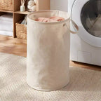 Cesto de ropa sucia plegable de lona beige con capacidad de 75 L para ropa de niños y bebés, no requiere montaje.