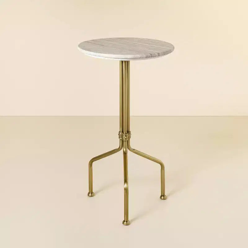 Mesa auxiliar decorativa de mármol y latón